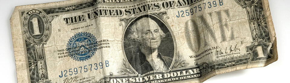 Ein US-Dollar und etwas Wechselgeld.